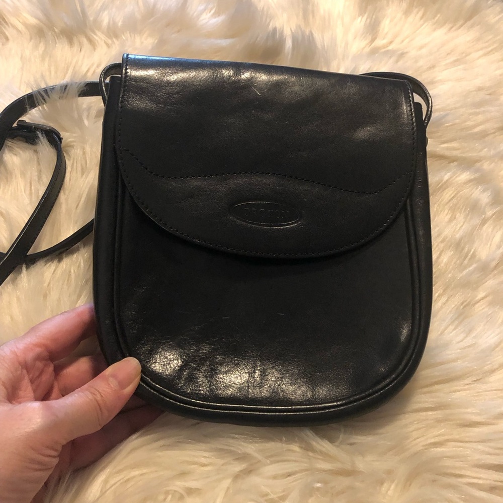 Oroton black leather crossbody purse with snap flap and slip pocket on back